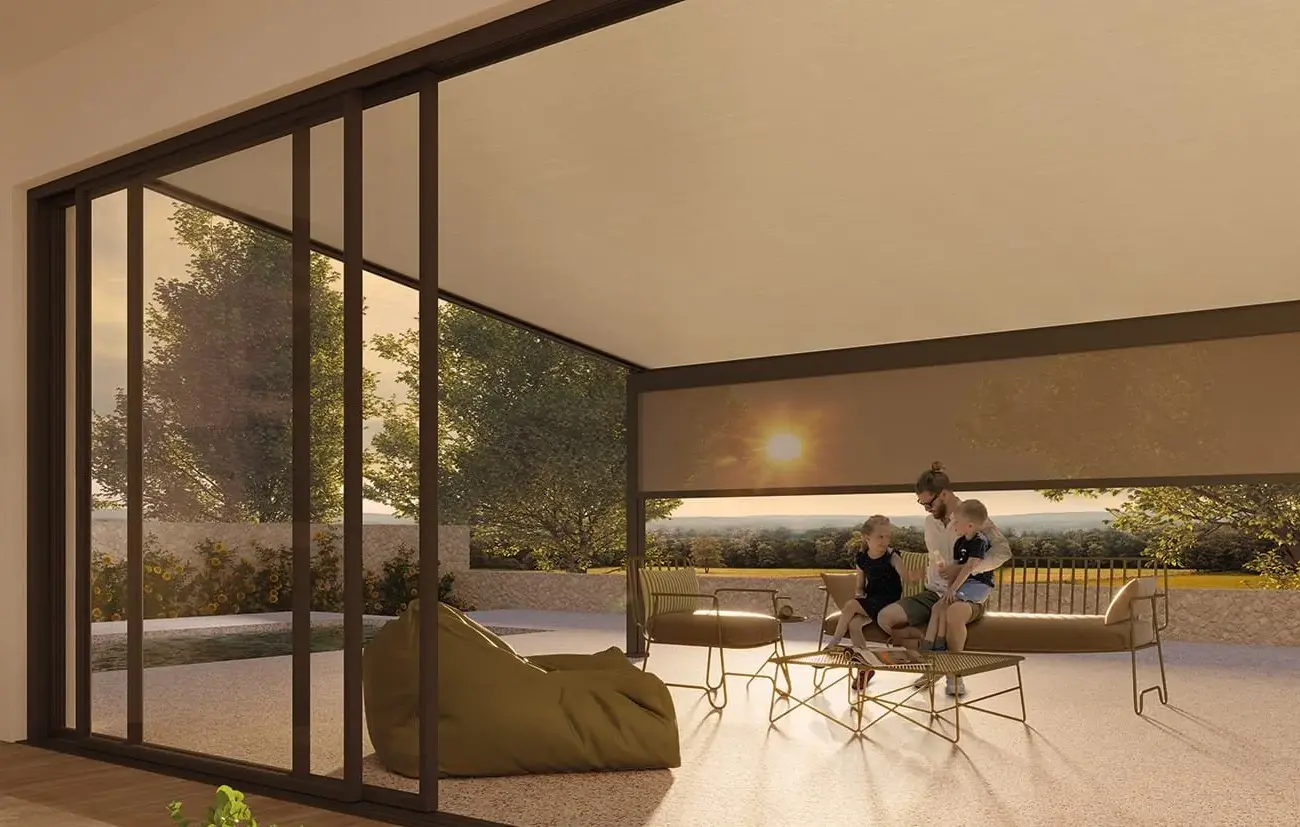 Moderne Pergolamarkise von Kadeco Modell 648 im Frühling mit Sonnenschutz und wetterfester Konstruktion